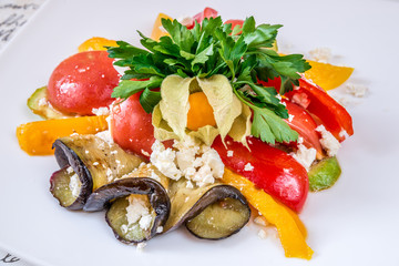 Fried zucchini, tomato, bell pepper and herbs