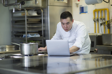 Chinese cook with portable computer