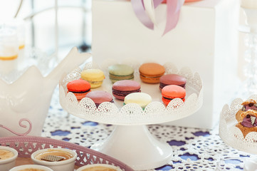 Macaroons Biscuits On White Stand.
