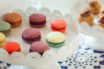 Macaroons Biscuits On White Stand.