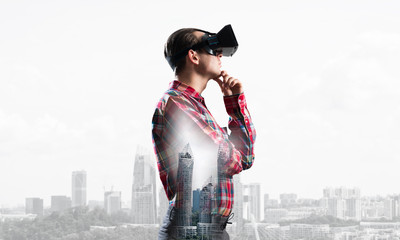 Guy wearing checked shirt and virtual mask with hand on chin