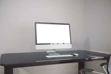 Workplace with blank white pc