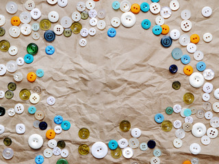 Background of multi-colored buttons. Abstract background. Paper background with buttons.