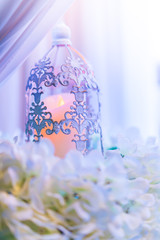 lanterns with candle in  wedding stage decoration .