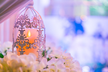 lanterns with candle in  wedding stage decoration .