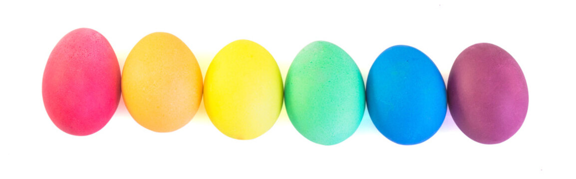 Row of easter eggs isolated on white background