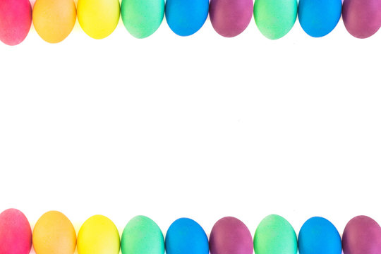 Rows of colorful easter eggs on a white background