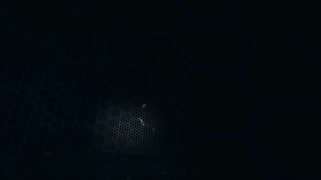 Abstract dark background honeycomb grid with lighting effect for technology concept