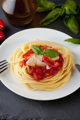 Spaghetti with tomato sauce and parmesan