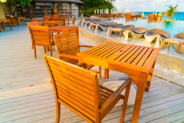 Fototapeta na wymiar Table and chairs at restaurant in tropical Maldives island .
