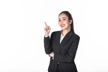 Young beautiful Asian businesswoman pointing something on white background. Image with clipping path.