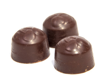 Chocolate candies isolated on white background.