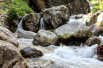 Naklejka na ściany i meble Waterfall and stream