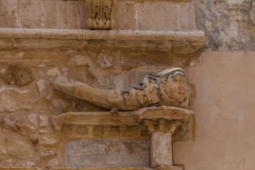 Ancient bas-relief on the building.