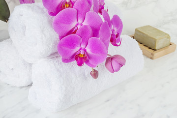 Obraz na płótnie Canvas Soap, orchid and towels