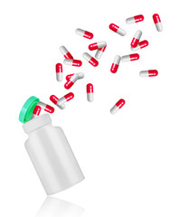 Pills fly out of medical bottle isolated on white background
