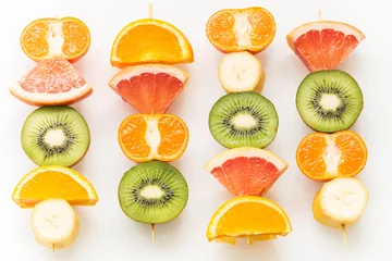 Zelfklevend Fotobehang fruit skewers / the concept of healthy eating © Rochu_2008