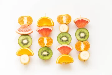 Zelfklevend Fotobehang fruit skewers / the concept of healthy eating © Rochu_2008