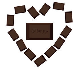 Pieces of chocolate bar out in the form of heart with the words 