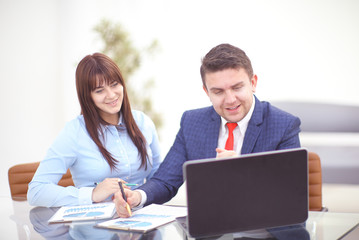 Obraz premium Businesswoman and businessman discuss business concept at work.