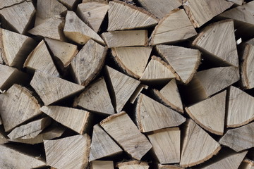 Wall firewood , Background of dry chopped firewood logs