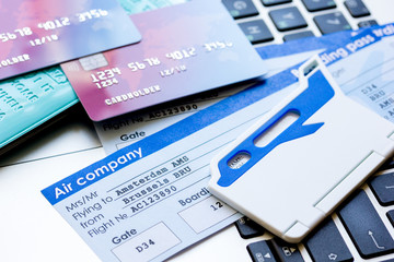 flight tickets payment online with cards on keyboard