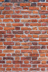 Old aged red brick wall texture background.