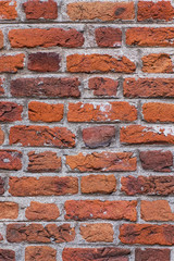 Old aged red brick wall texture background.