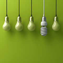 One hanging eco energy saving light bulb different and stand out from old incandescent lightbulbs with reflection on green background, individuality and different creative idea concept . 3D rendering.