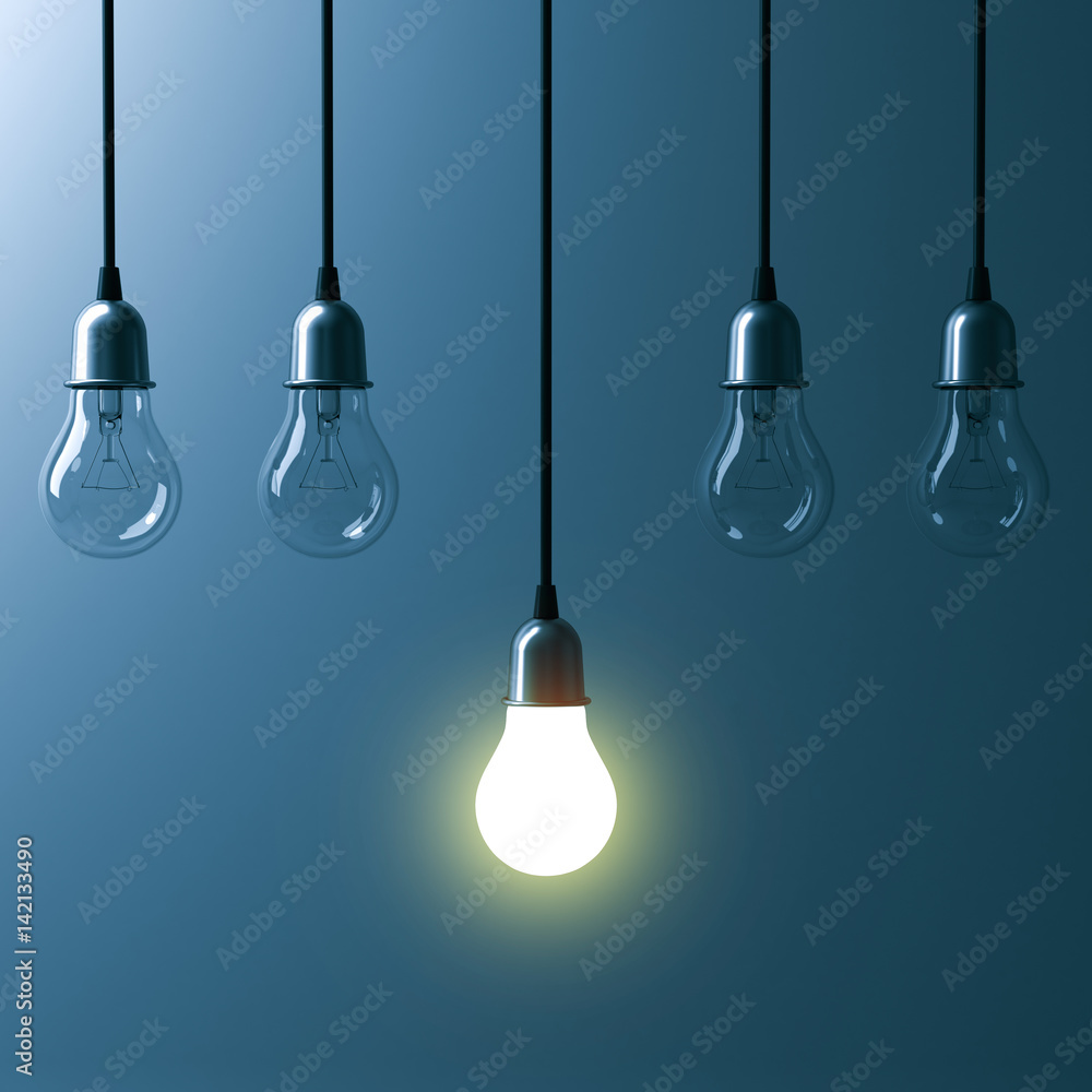 Fototapete one hanging light bulb glowing different and standing out from unlit incandescent bulbs with reflect