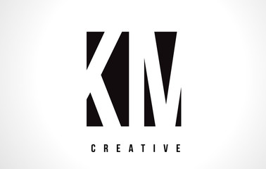 KM K M White Letter Logo Design with Black Square.