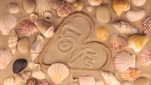 Rotation of the heart is made of rope and the word love.