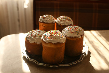 Authentic Traditional Russian Orthodox Easter bread the kulich or pasha, easter cakes topped with sugar glaze
