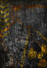 Old grunge distressed black metal plate with radiation warning