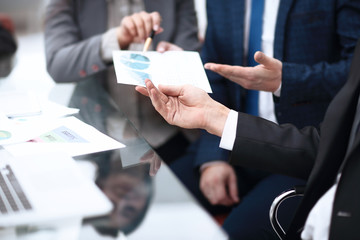 A group of successful businessmen. Discussion of the important contract of the company.