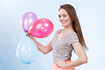Naklejka premium Woman summer joyful girl with colorful balloons