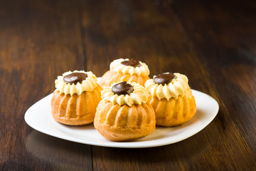 Sweet cupcakes with cream