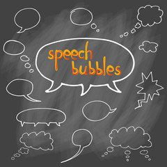 Vector hand drawn set of comic speech bubbles. Isolated. White outlines. Collection of cartoon speech and thought communication bubbles in doodle style. Blank empty speech bubbles. On chalk background