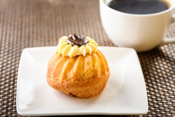 Cupcake and cup of coffee