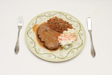 Kotlet z indyka w sosie pieczeniowym