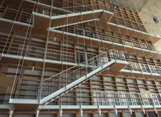 staircase along the wall with racks