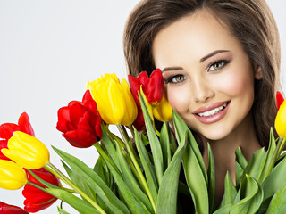 Closeup face of  beautiful happy woman with flowers