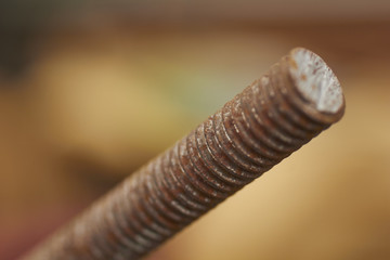 a rusted steel threaded rod