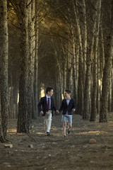 Fototapeta premium Children they run for the forest of trees