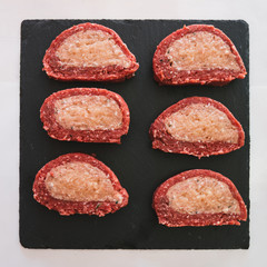 Roast beef stuffing and ready to be cooked.