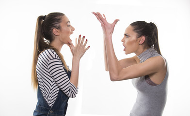two girls having heavy talk argue conflict concept 
