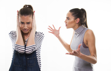 two girls having heavy talk argue conflict concept 