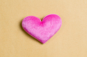 Pink hearts on recycle paper background