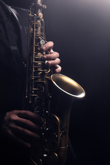 Saxophone player Saxophonist playing sax alto. Musical instruments