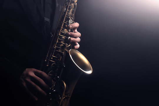 Saxophone player Saxophonist playing jazz music instrument